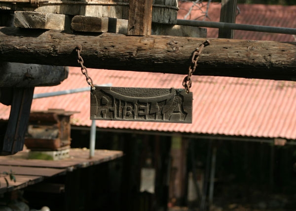 Rubelia shingle hanging from the Aermoto 1901 windmill.