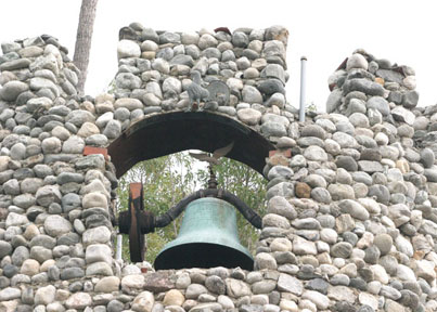 Bell atop the clock tower at Rubel Pharms